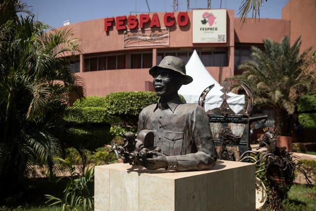 A statue of Paulin Soumanou Vieyra, considered one of the founding fathers of African cinema, is displayed at the FESPACO (Pan African Film and Television Festival) headquarters in Ouagadougou, Burkina Faso. 
