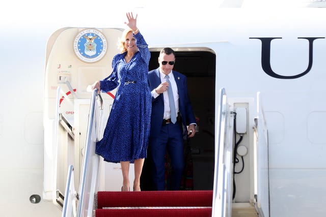 First lady of the United States Jill Biden waves as she arrives in Nairobi, Kenya