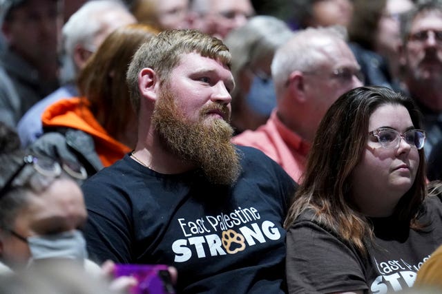East Palestine residents listen to a town hall meeting at East Palestine High School about the Norfolk Southern freight train derailment on February 3 in East Palestine, Ohio