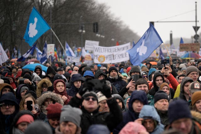 People attend a demonstration supporting a so-called ‘Manifesto for Peace’ in Berlin