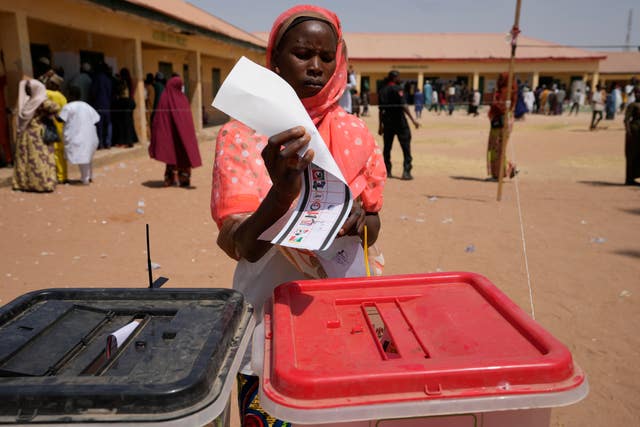 A woman casts her vote in Yola
