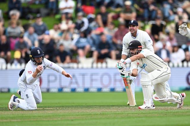 Ollie Pope takes a catch to dismiss Daryl Mitchell 