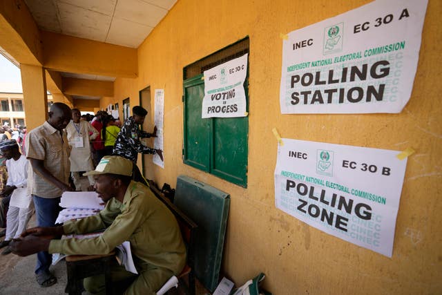 People arrive to cast their votes during the presidential elections in Yola, Nigeria