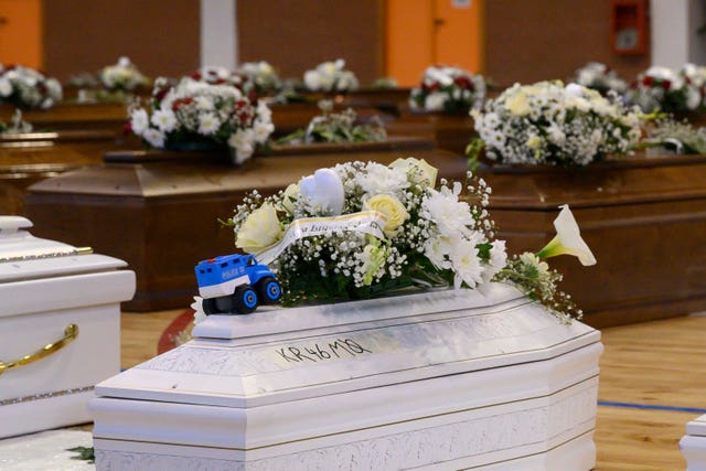 Coffins of those who died in the shipwreck