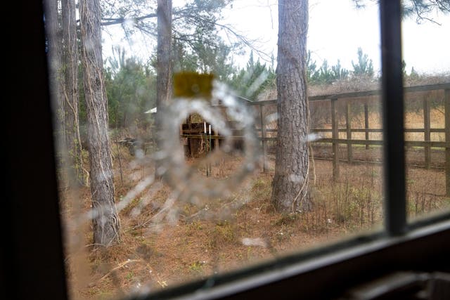 A bullet hole is seen from inside of the feed room at the Murdaugh Moselle property on Wednesday, March 1, 2023 in Islandton