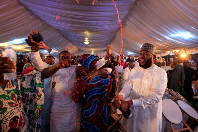 Supporters of Presidential candidate Bola Tinubu of the All Progressives Congress celebrate the victory of their candidate in the presidential elections at the Party’s campaign headquarters in Abuja, Nigeria, Wednesday, March 1, 2023