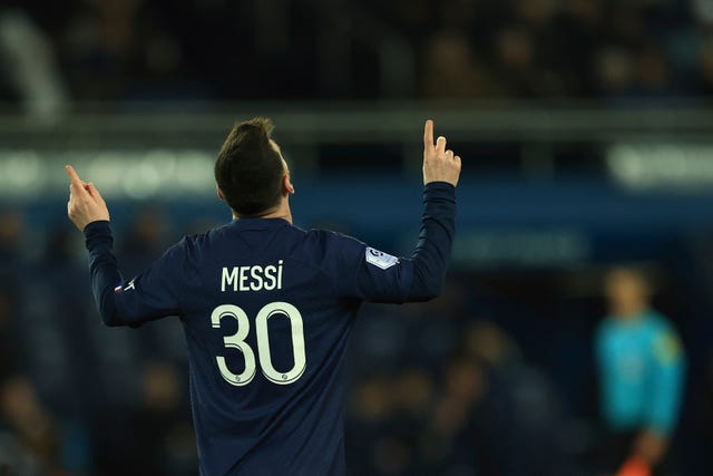 Lionel Messi celebrates after scoring PSG's opening goal 