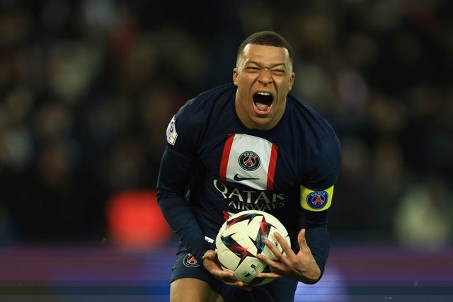 Kylian Mbappe celebrates scoring