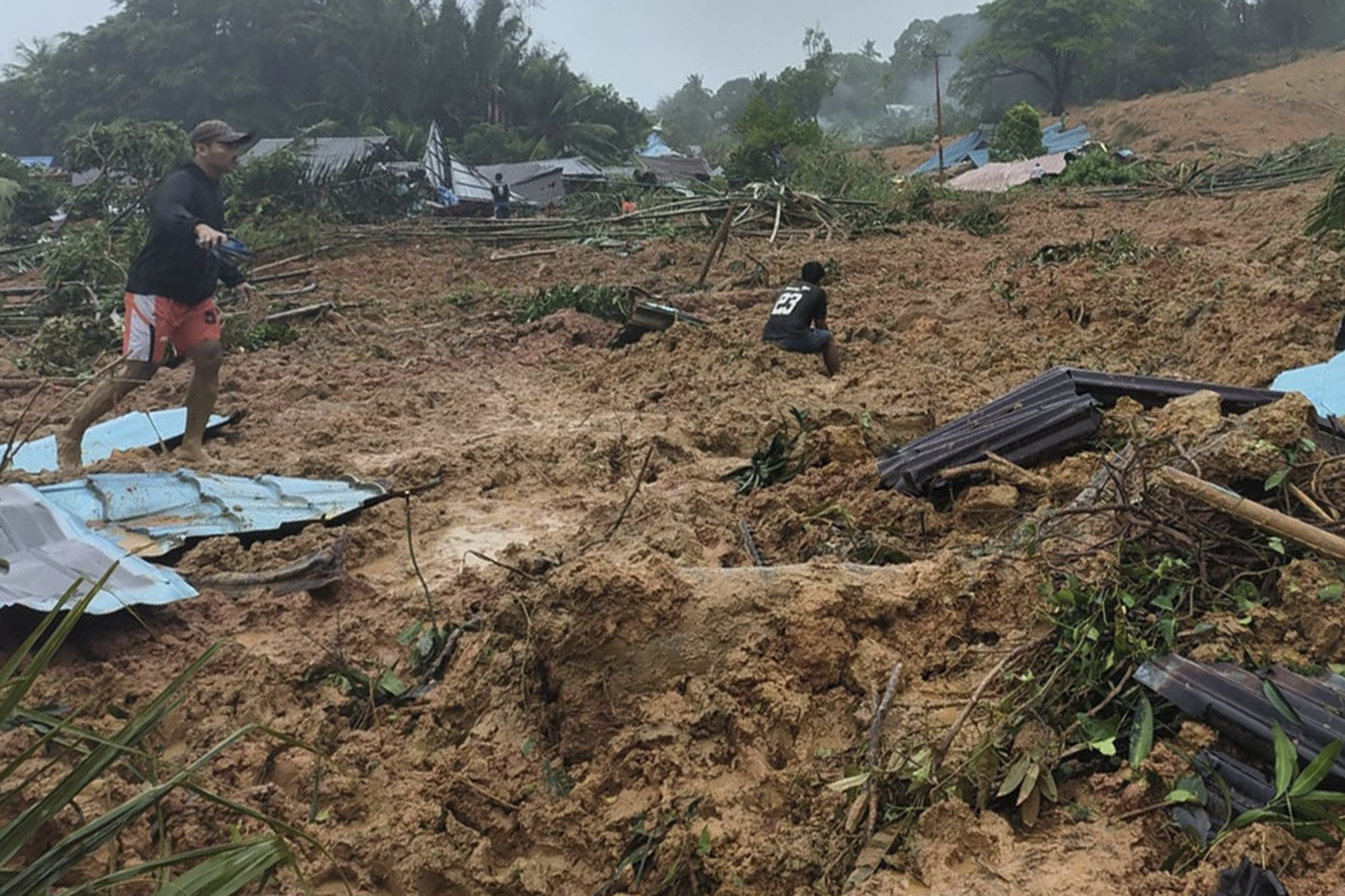 Rescuers Search For Dozens Of Missing People After Deadly Landslide In ...