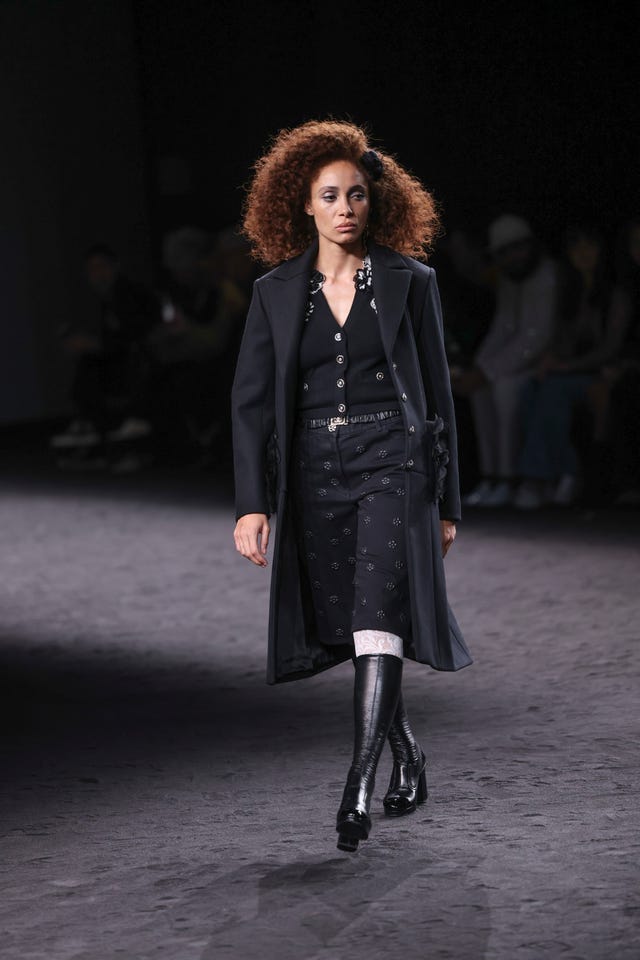 Adwoa Aboah wears a creation as part of the Chanel Fall/Winter 2023-2024 ready-to-wear collection