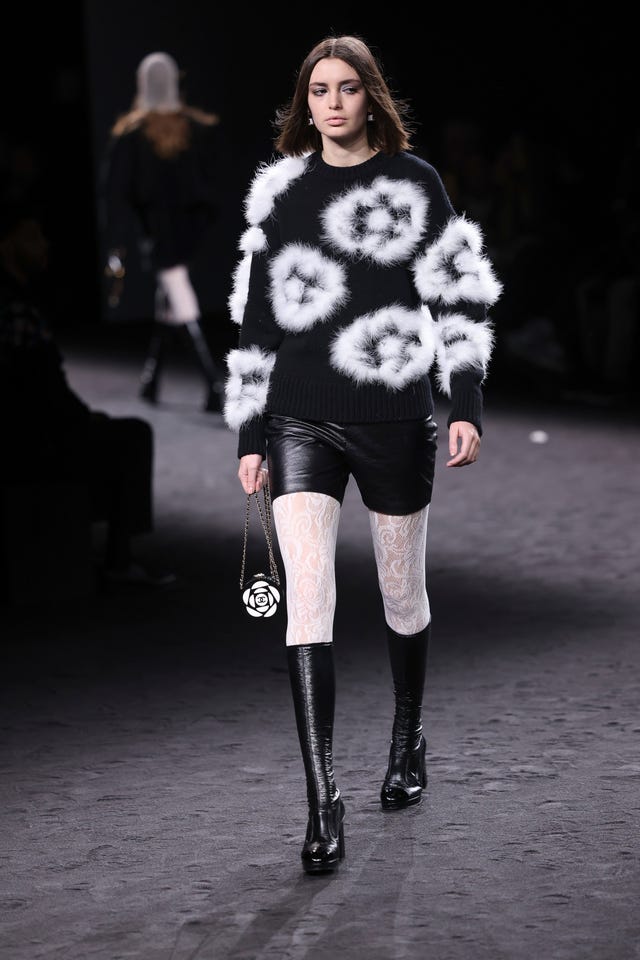 A model wears a creation as part of the Chanel Fall/Winter 2023-2024 ready-to-wear collection
