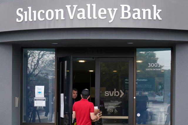 A food delivery worker enters Silicon Valley Bank in Santa Clara, California