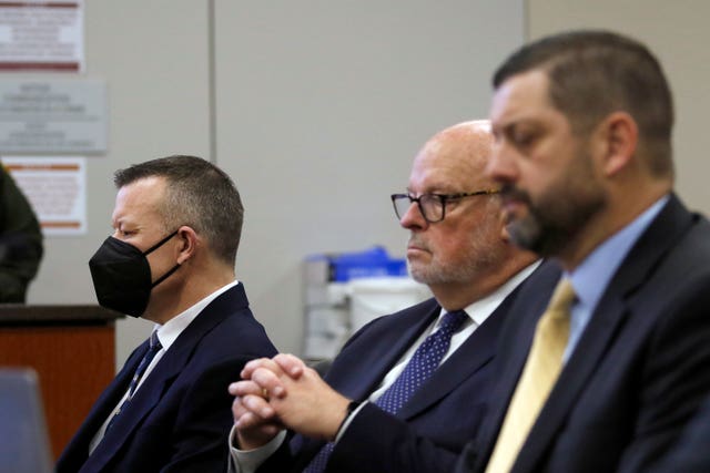 Paul Flores, left, appears in Monterey County Superior Court in Salinas, Calif., with defense attorney Robert Sanger and JT Camp, investigator for the San Luis Obispo District Attorney’s office, Friday, March 10, 2023. Flores, convicted of killing Kristin Smart who vanished from a California college campus more than 25 years earlier, was sentenced to 25 years to life in prison 