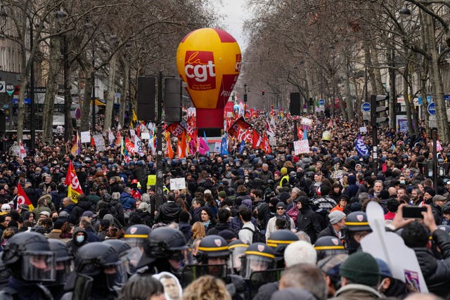 Protesters march during a demonstration in Paris