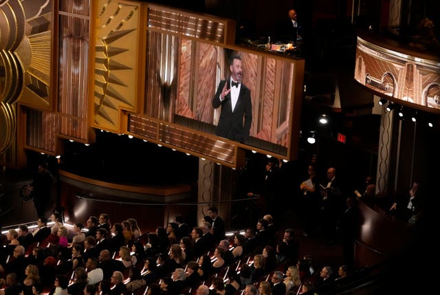 Host Jimmy Kimmel appears onscreen at the Oscars at the Dolby Theatre in Los Angeles