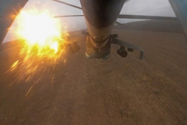 The Mi-24 releases flares after an attack on Russian positions