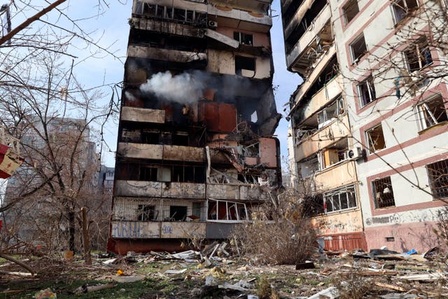 A residential multi-storey building is seen damaged after a Russian missile hit it in southeastern city of Zaporizhzhia