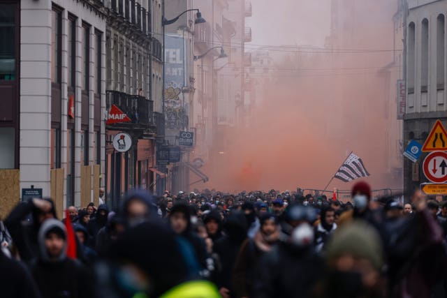 Demonstrators march during a protest in Rennes in western France 