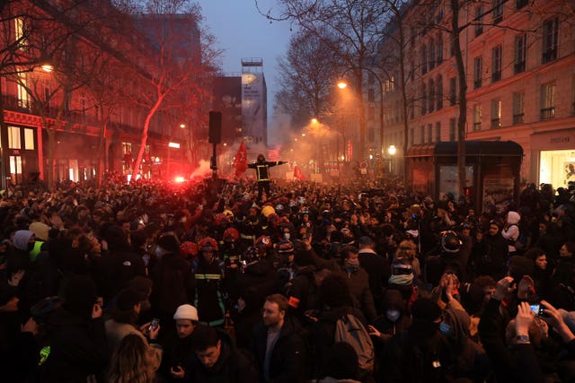 Protesters march during a rally in Paris