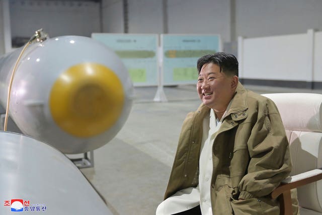 North Korean leader Kim Jong Un inspects what the country claims is an unmanned underwater nuclear attack craft