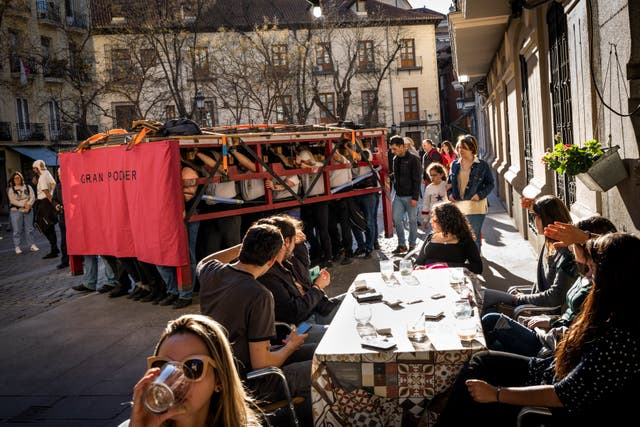 Porters of ‘Nuestro Padre Jesus del Gran Poder y la Esperanza Macarena’ brotherhood practice in downtown Madrid