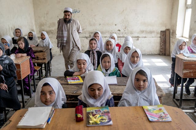 Girls in a classroom in Kabul on the first day of the new school year 