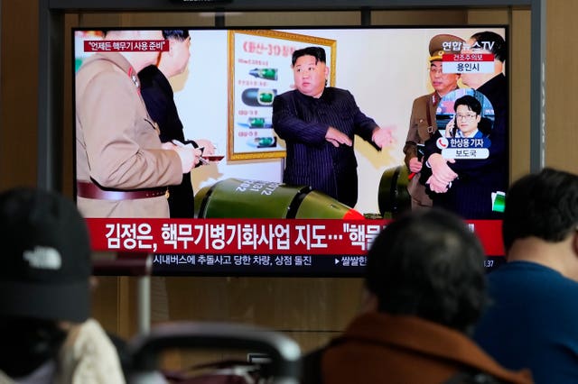 A TV screen shows an image of North Korean leader Kim Jong Un during a news program at the Seoul Railway Station in Seoul, South Korea, Tuesday, March 28, 2023