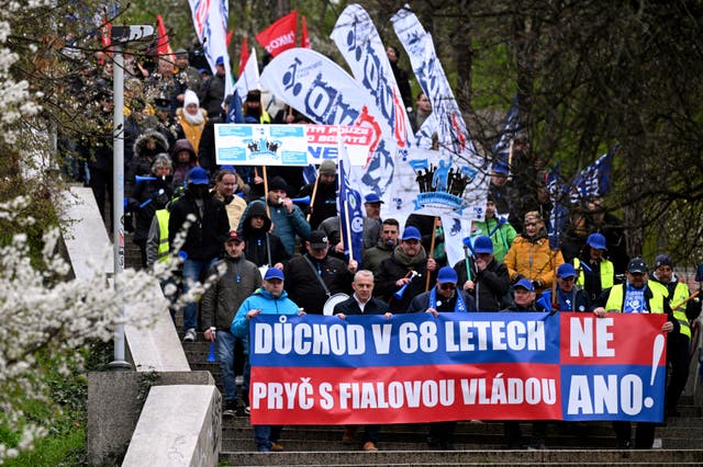 Protesters march in Prague against changes in the pension system being considered by the Czech Republic government