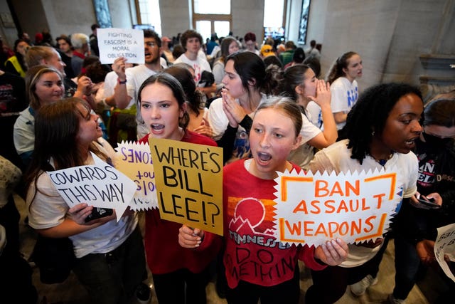 Students yell, asking for gun reform legislation and support the Tennessee Three outside the House chamber Thursday, April 6, 2023, in Nashville, Tenn