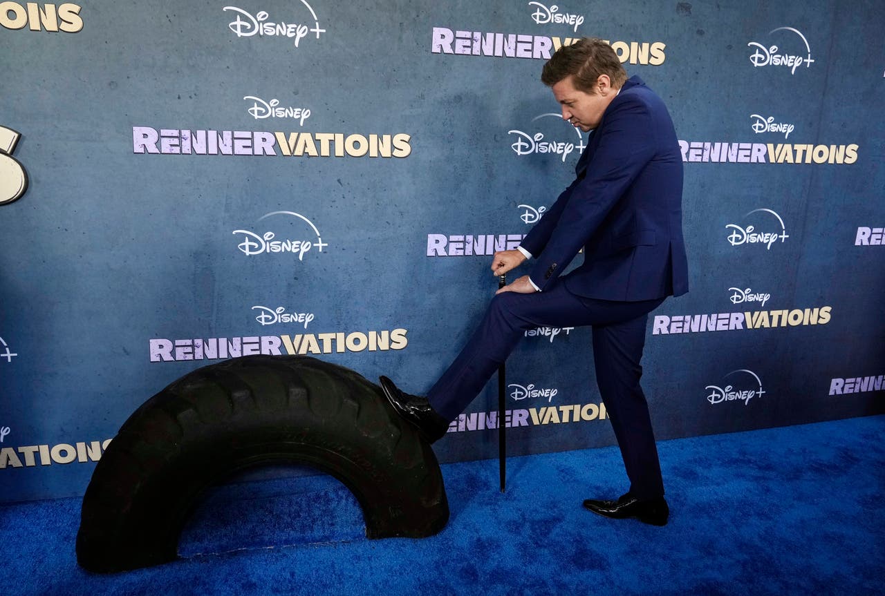 Jeremy Renner assisted by scooter at first red carpet since snowplough