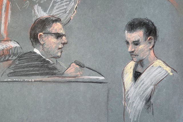 Teixeira, right, appears in court on April 14