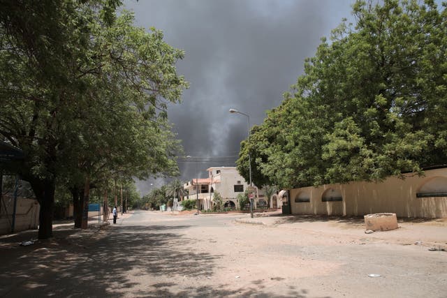 Smoke is seen rising from a neighbourhood in Khartoum, Sudan 
