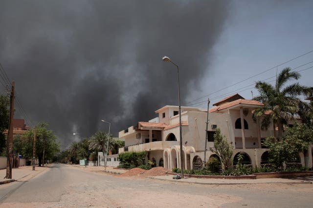 Smoke is seen rising from a neighbourhood in Khartoum