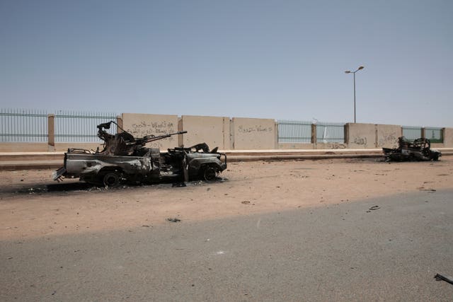 Destroyed military vehicles are seen in southern Khartoum, Sudan 