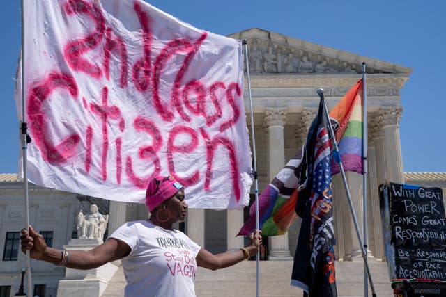 Nadine Seiler, of Waldorf, Md., demonstrates in favor of access to abortion pills on Friday outside the Supreme Court in Washington