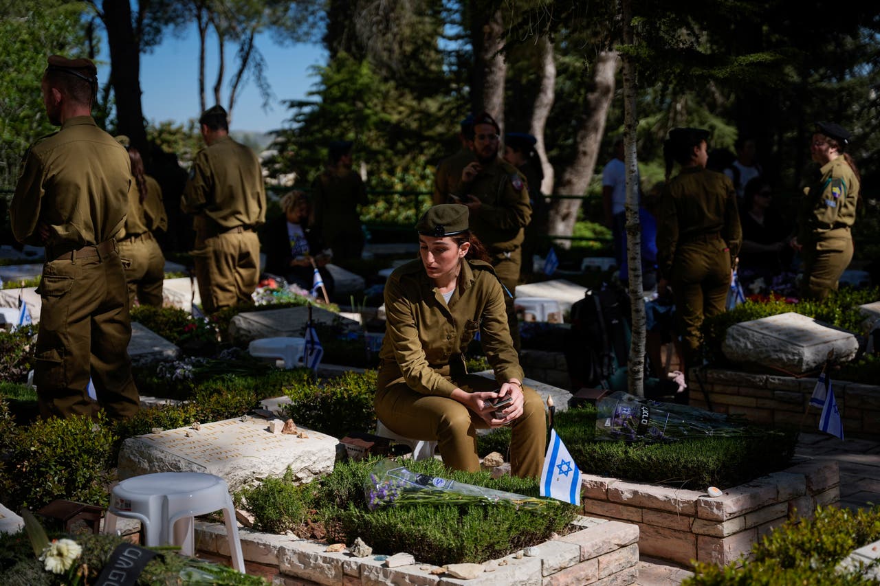 Israelis remember fallen soldiers and attack victims on Memorial Day ...