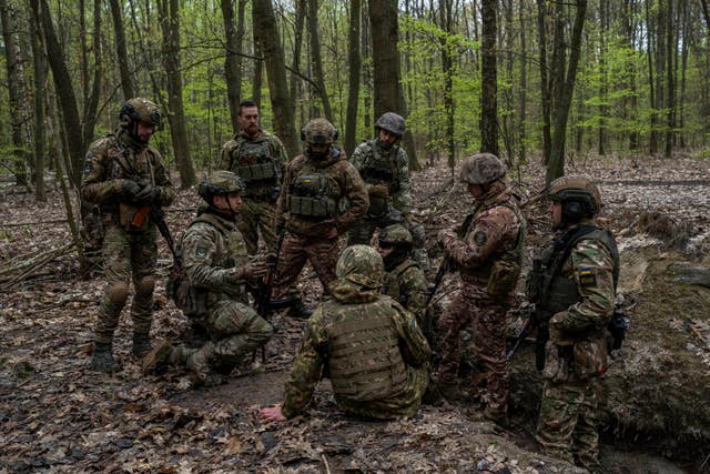 Members of the Ukrainian National Guard from the Bureviy Brigade take part in a military exercise in the Kyiv region