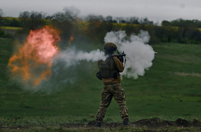 A Ukrainian soldier fires an RPG during his training at the frontline positions near Vuhledar, Donetsk region, Ukraine 