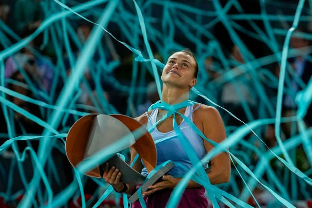 Aryna Sabalenka holds the Madrid Open trophy