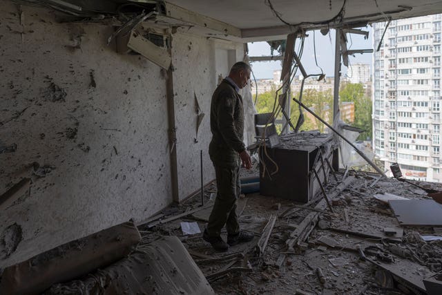 Kyiv mayor Vitali Klitschko in an apartment building damaged by a drone that was shot down during a Russian overnight strike, amid Russia’s attack, in Kyiv, Ukraine 