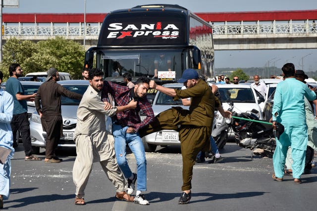 Plainclothes police officers beat a supporter of Pakistan’s former prime minister 