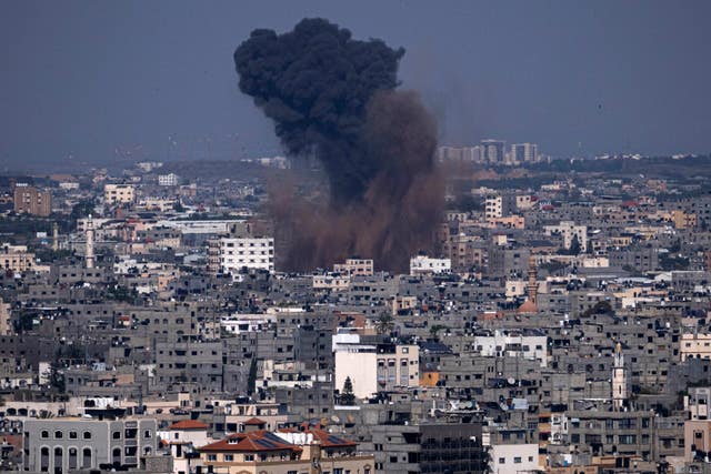 Smoke rises from an Israeli airstrike in Gaza City 