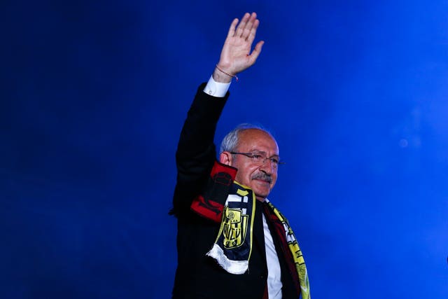 Turkish CHP party leader Kemal Kilicdaroglu gestures to supporters during an election campaign rally in Ankara, Turkey