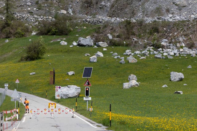 A road is blocked in front of the 'Brienzer Rutsch' rockfall danger zone in Brienz-Brinzauls, Switzerland