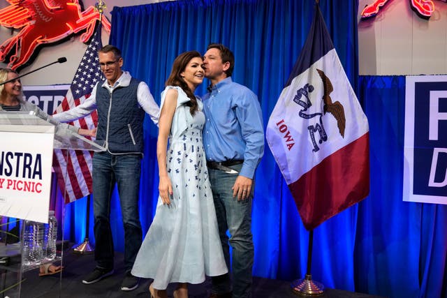Florida governor Ron DeSantis kisses his wife Casey after speaking at a fundraising picnic for US Representative Randy Feenstra in Sioux Centre, Iowa 