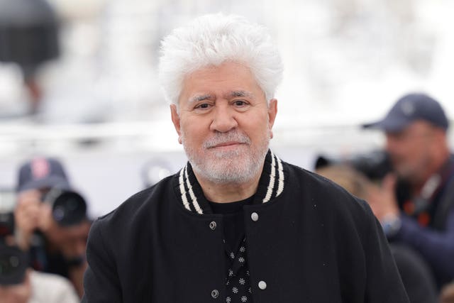 Director Pedro Almodovar poses at the photo call for the film Strange Way Of Life