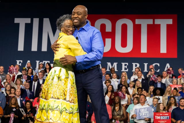 Republican presidential candidate Tim Scott hugs his mother Frances Scott after announcing his candidacy for president of the United States on the campus of Charleston Southern University in North Charleston, South Carolina