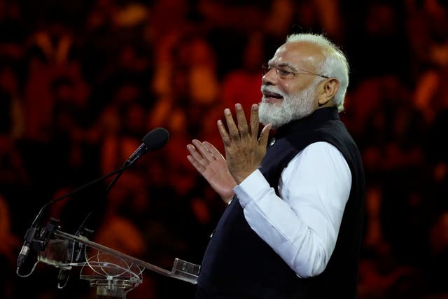 Indian Prime Minister Narendra Modi gestures as he delivers his speech during an Indian community event at Qudos Bank Arena in Sydney, Australia (Mark Baker/AP)