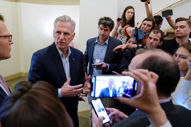 House Speaker Kevin McCarthy of Calif., speaks with members of the press about debt limit negotiations Saturday, May 27, 2023, on Capitol Hill in Washington