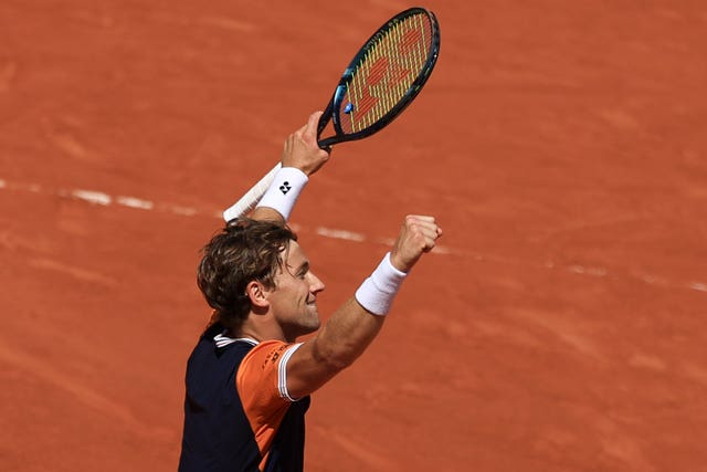 Casper Ruud celebrates winning his fourth-round match